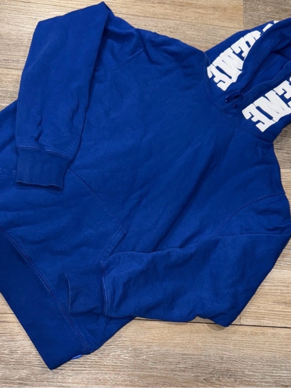 Supreme Blue Hoodie with White Logo on Hood
